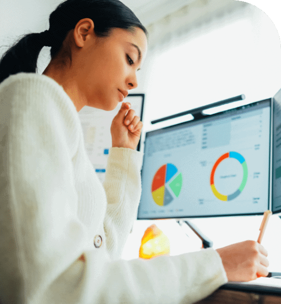 girl-writing-with-screen-behind-her