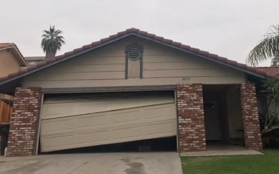 Garage door repair needed in Phoenix, AZ