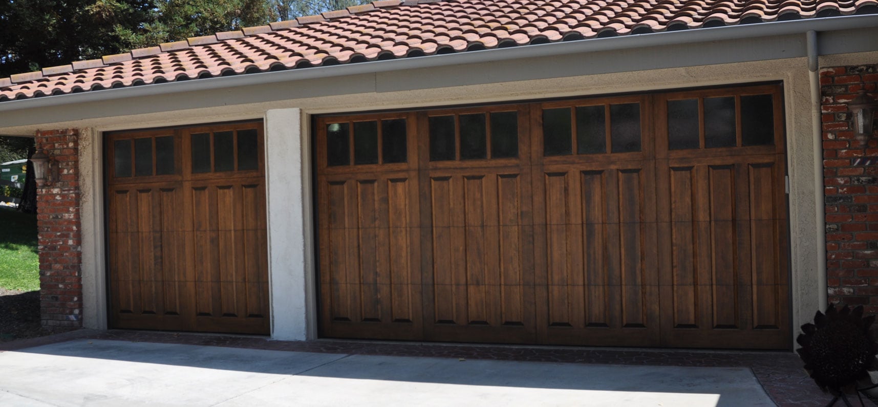 Wood carriage style garage doors installed in Arcadia, Phoenix AZ