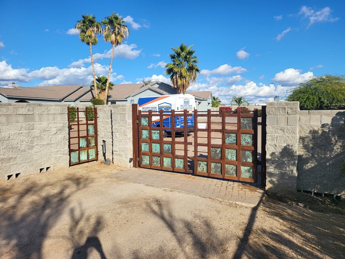 Rustic wood and copper patina driveway gate, Phoenix AZ