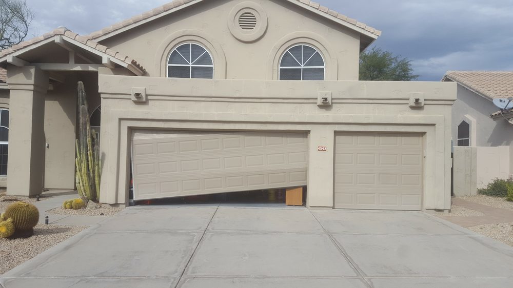 Garage door off track before repair, Phoenix AZ