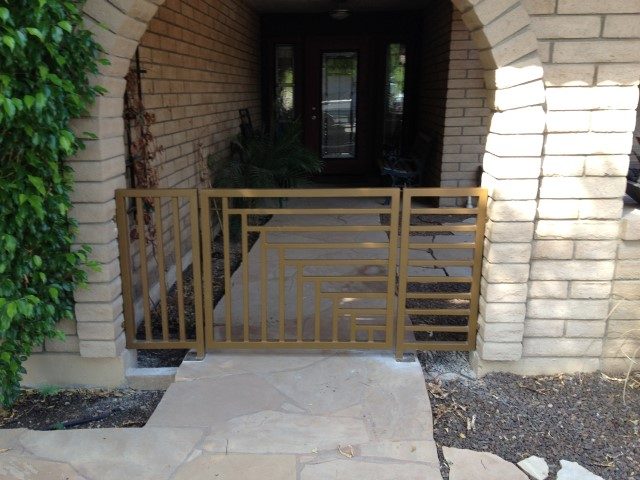 Geometric bronze courtyard entry gate in Phoenix AZ