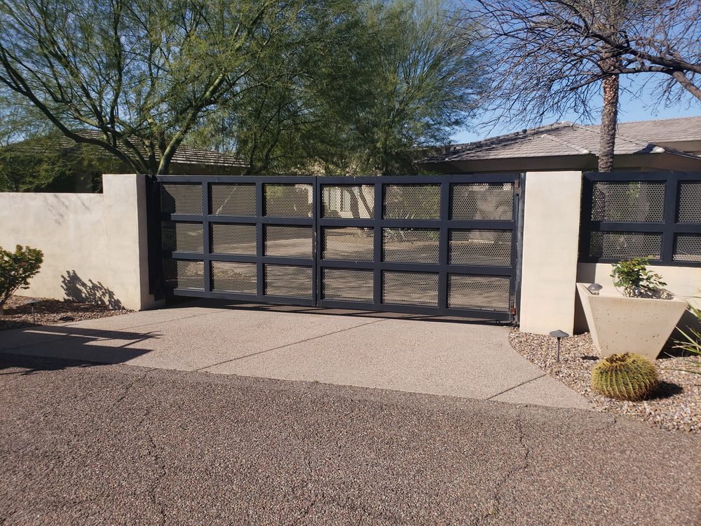 Modern driveway gate with stainless steel accents, Phoenix AZ