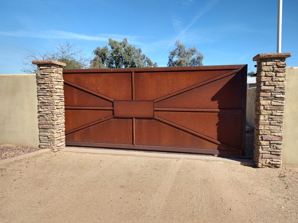 Corten steel driveway gate installation, Scottsdale AZ