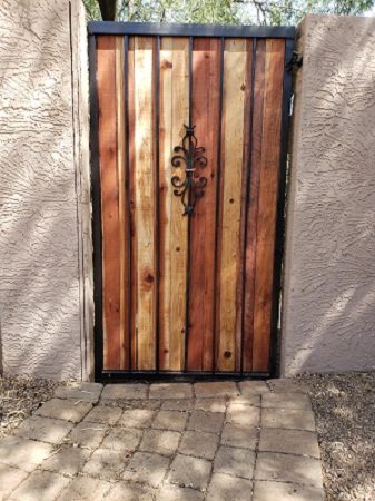 Fleur de lis wood and iron pedestrian gate in Scottsdale AZ