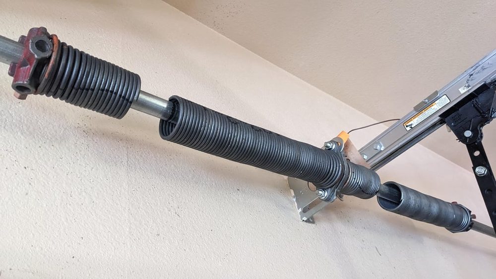 Broken garage door spring before replacement, Scottsdale AZ