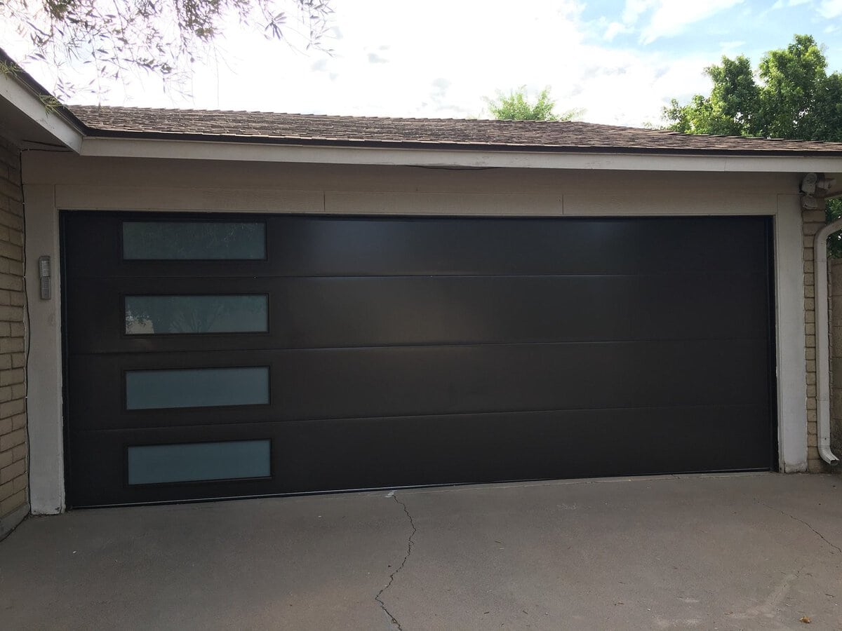 Modern dark garage door with horizontal glass windows, Scottsdale AZ