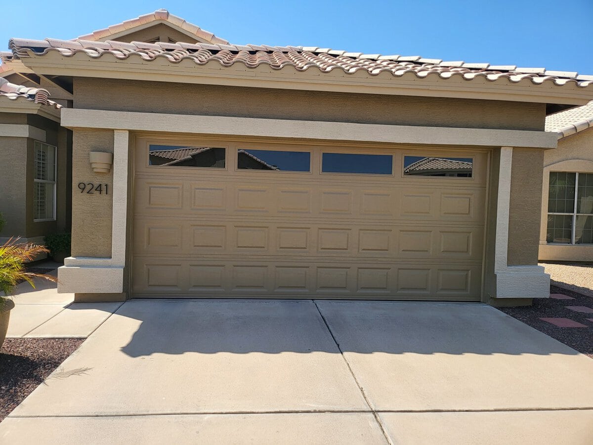 Newly installed garage door on home with arched windows, Scottsdale AZ