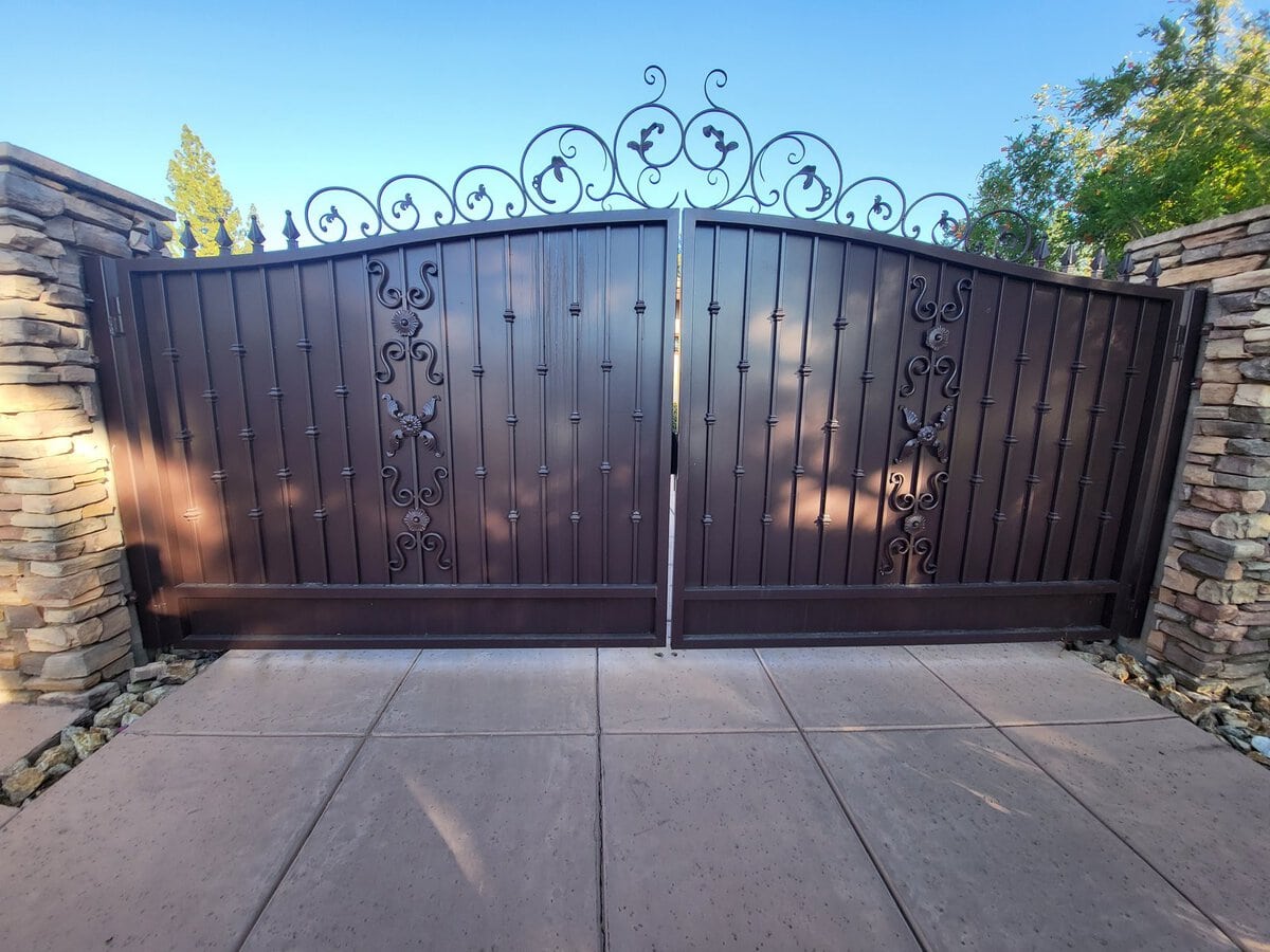 Ornate automatic estate gate in Scottsdale AZ — annual pre-summer inspection prevents costly emergency repairs during peak season