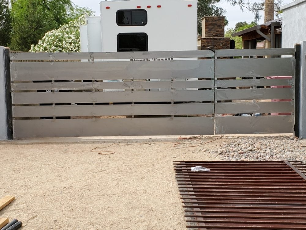 Gray slat panel RV gate installation, Scottsdale AZ