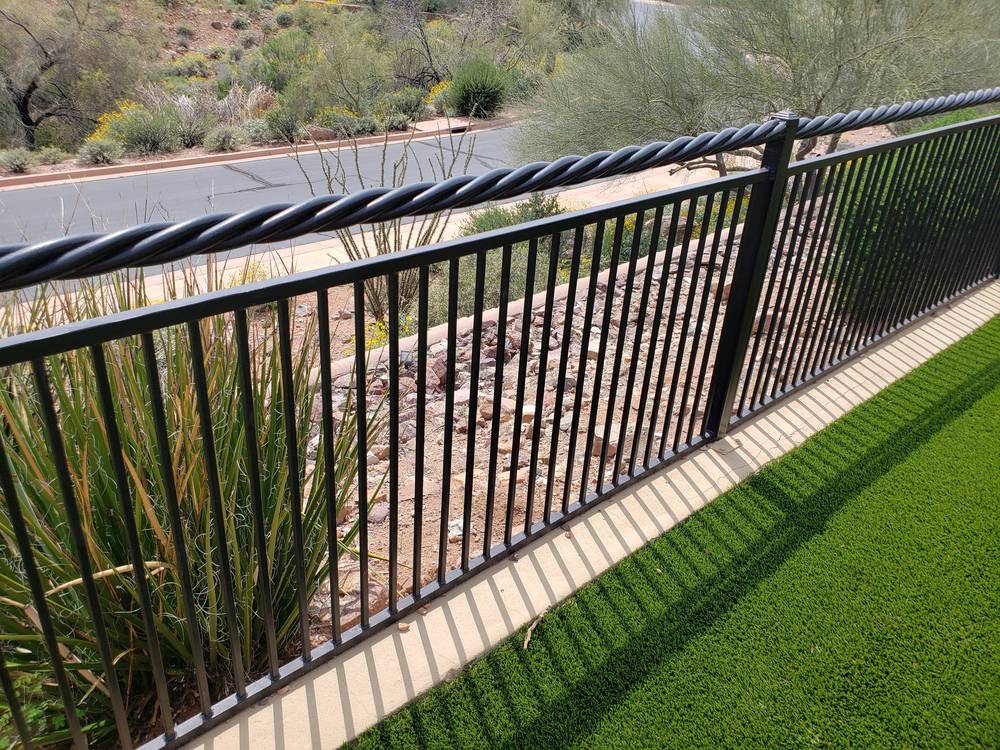 View fence along hillside road, Scottsdale AZ