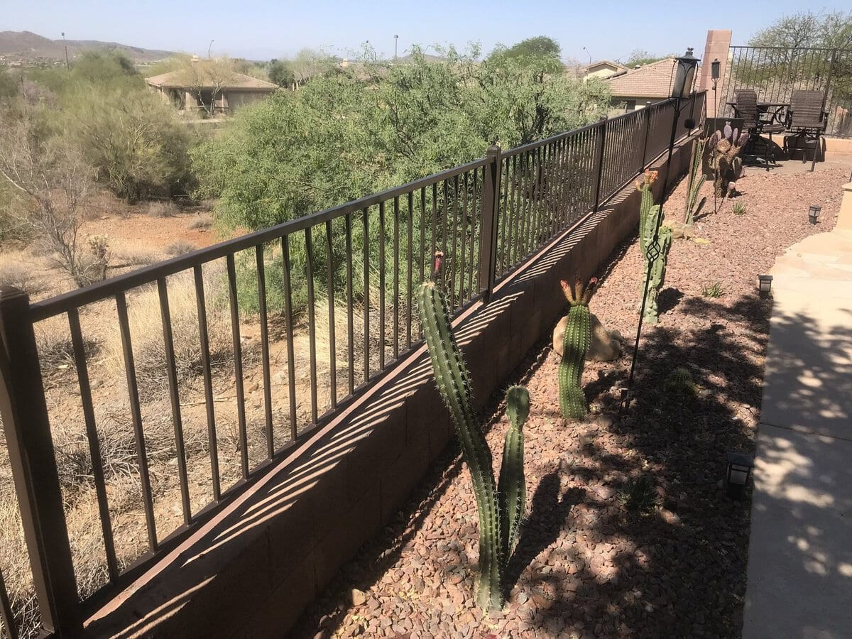 Wrought iron view fence installation in Scottsdale AZ