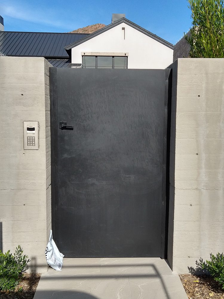 Modern gate with keypad entry access in Phoenix, AZ