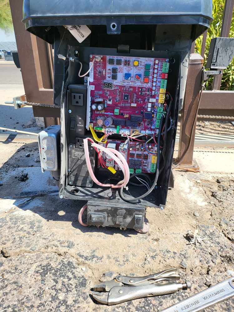 Rodent nesting damage found inside an automatic gate operator during a repair call in Phoenix, Arizona