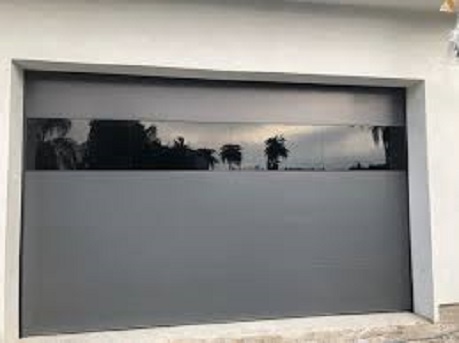 Flush panel garage door with glass band installed in Desert Ridge, Phoenix AZ