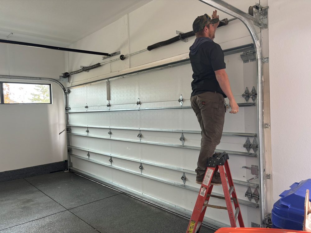 Garage door spring tension adjustment in Phoenix, AZ