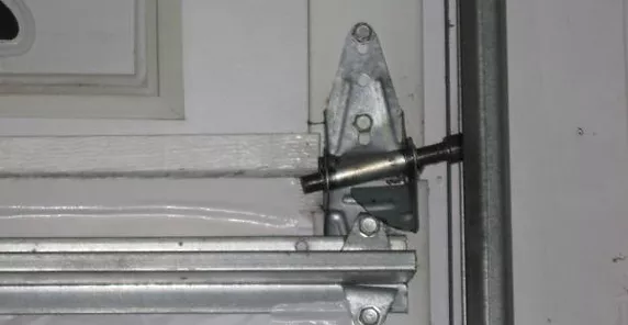 Broken garage door hinge and roller assembly repair in Scottsdale AZ