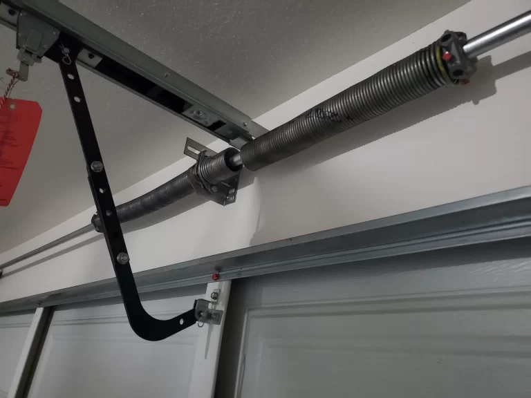 Broken garage door torsion spring with visible gap in Scottsdale AZ