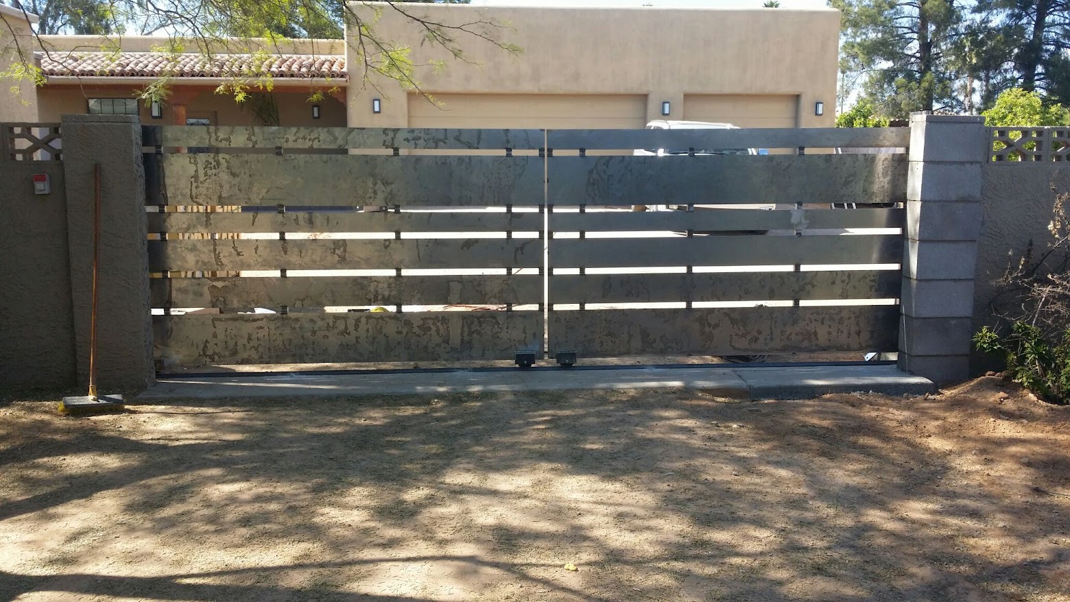 Custom double slide driveway gate installation in Scottsdale AZ