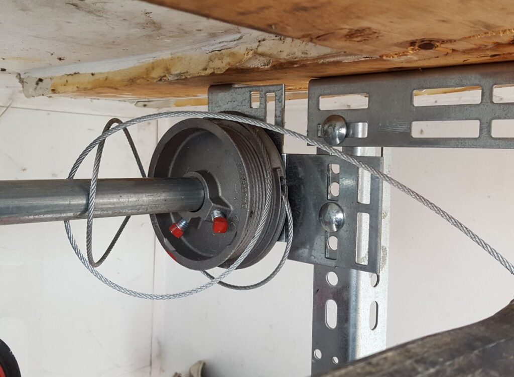 Close-up of garage door cable repair in Scottsdale, AZ