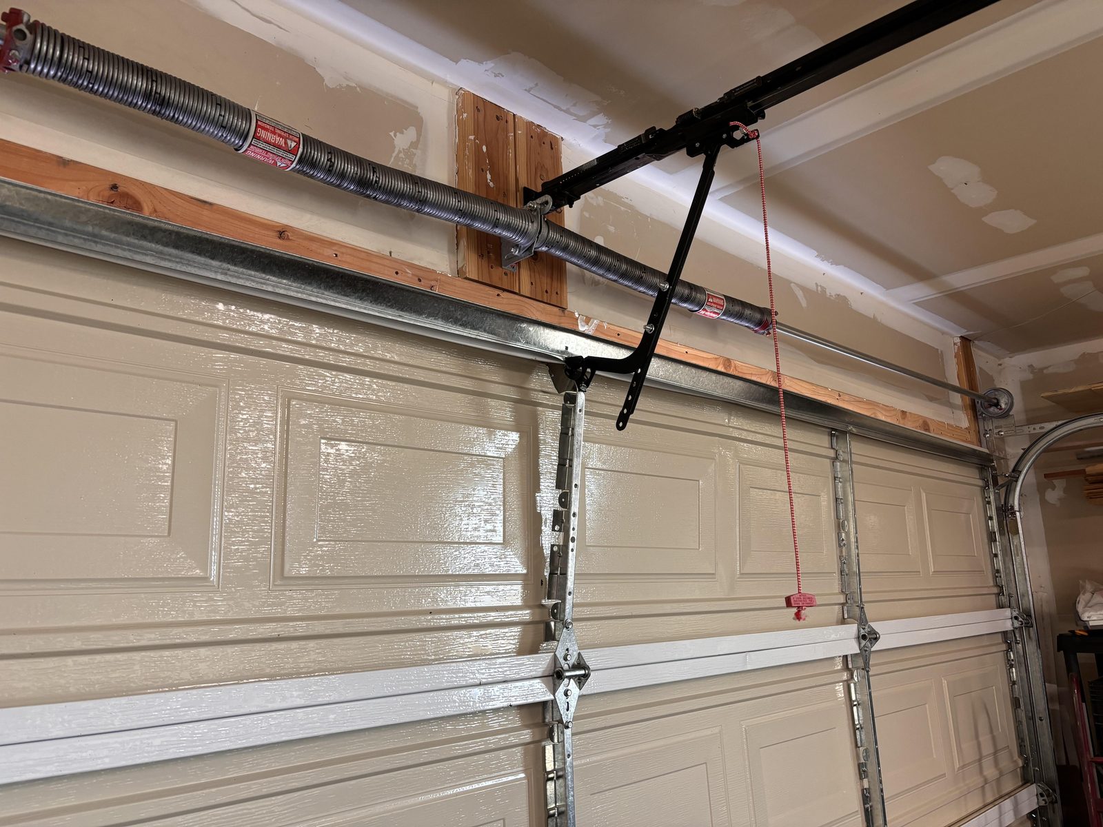 Garage door off track and bent needing repair in Scottsdale AZ