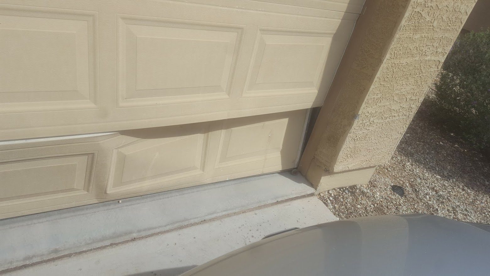 Garage door panel gap and alignment issue Scottsdale AZ