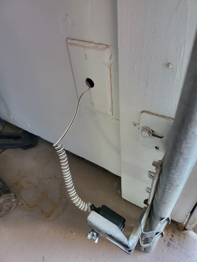Garage door safety sensor wiring repair in Scottsdale AZ