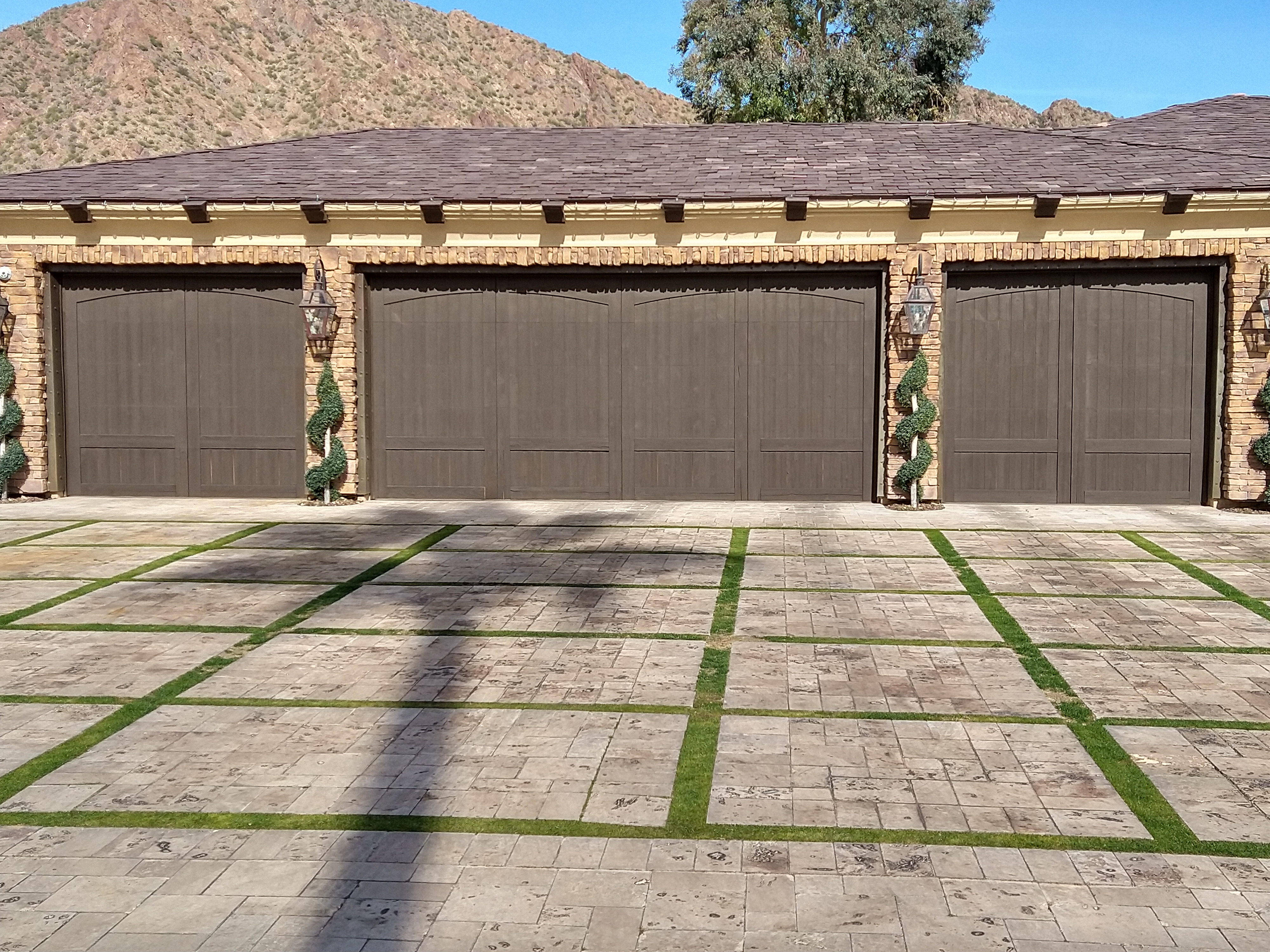Modern black flush panel garage door installed in Scottsdale AZ