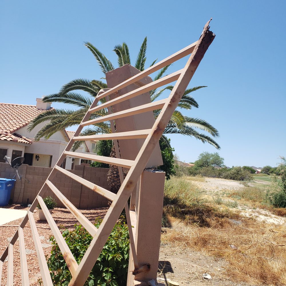 Fence leaning after Arizona monsoon wind damage, Scottsdale AZ